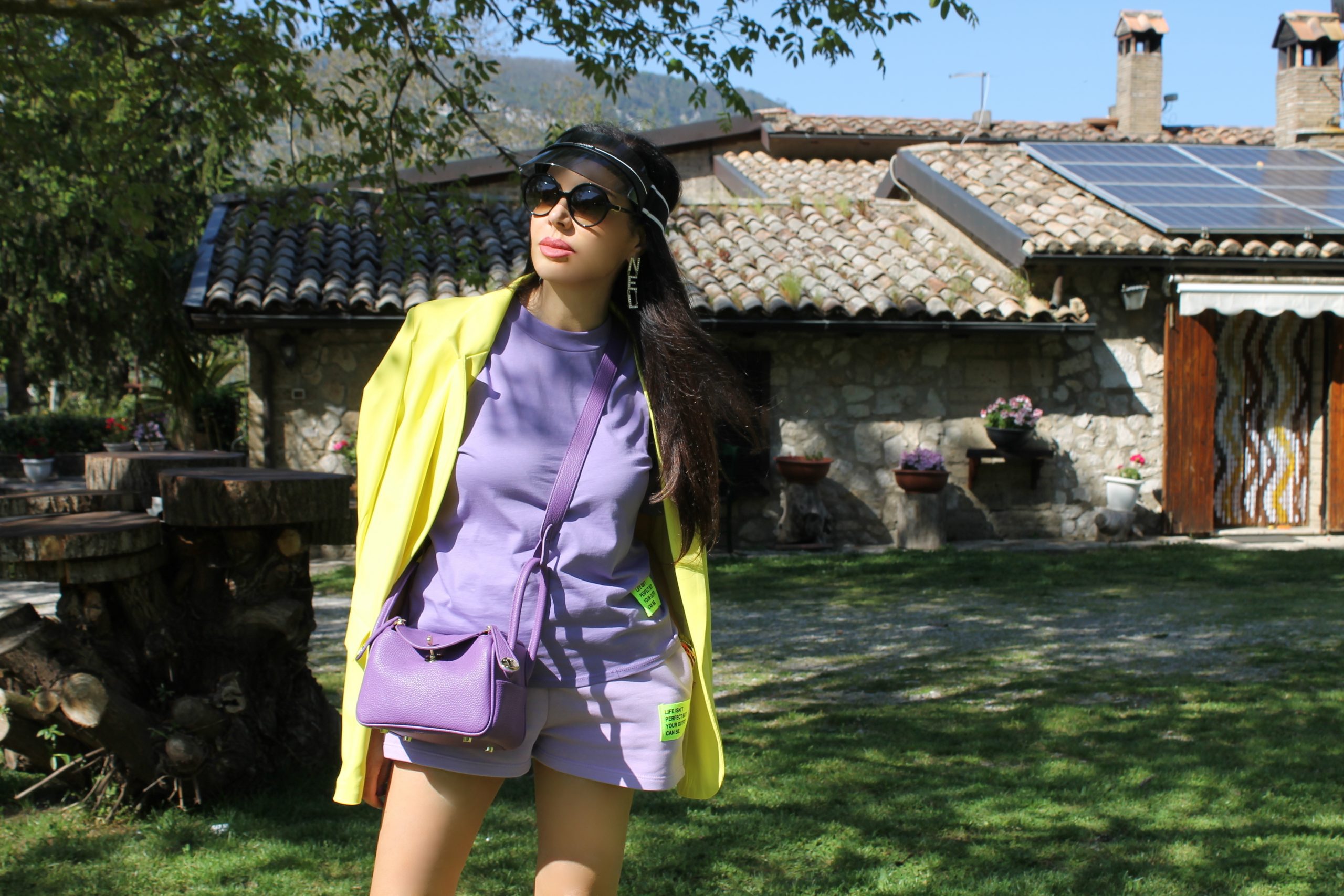 sporty comfy outfit lilac and yellow look chanel sneakers Paola Lauretano 