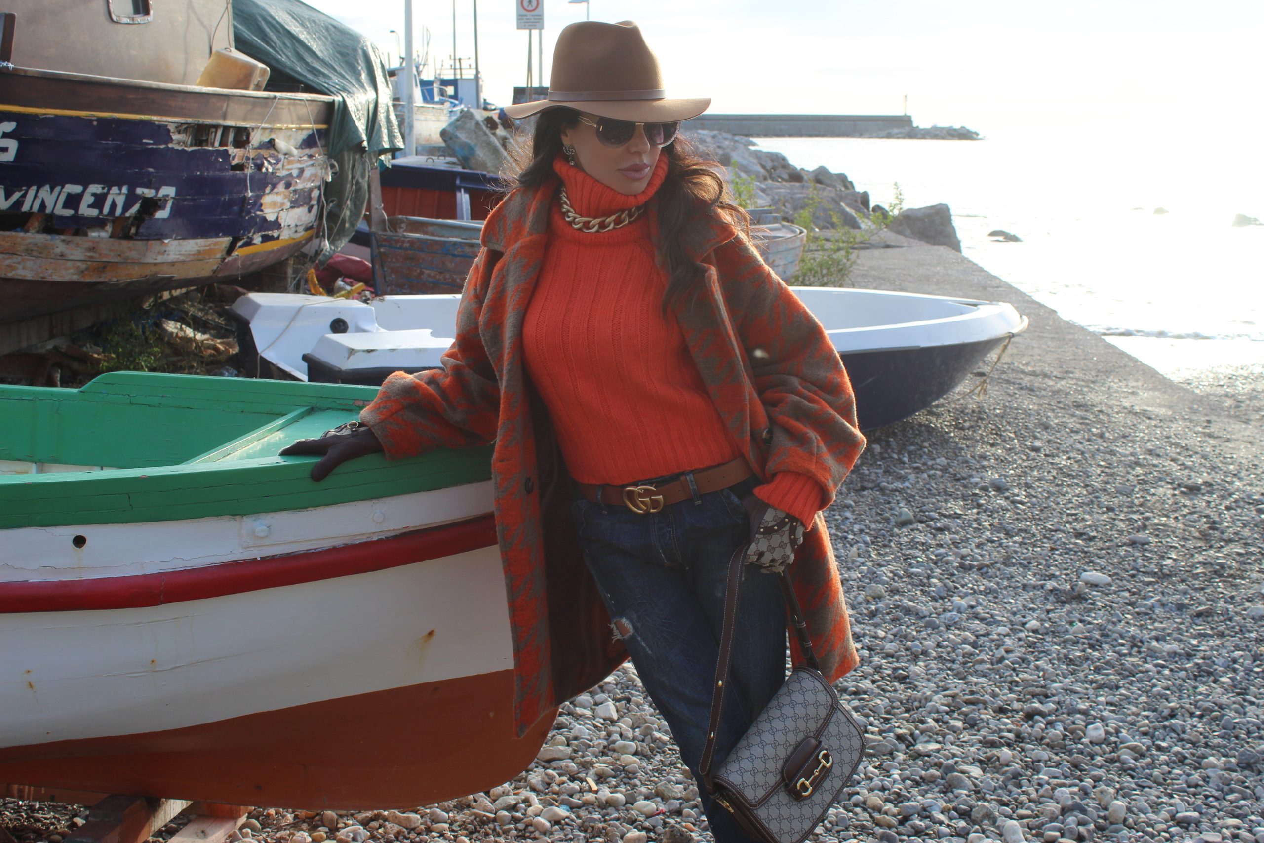 LUMINA FASHION coat and turtleneck sweater  DOLCE & GABBANA jeans  GUCCI accessories Paola Lauretano