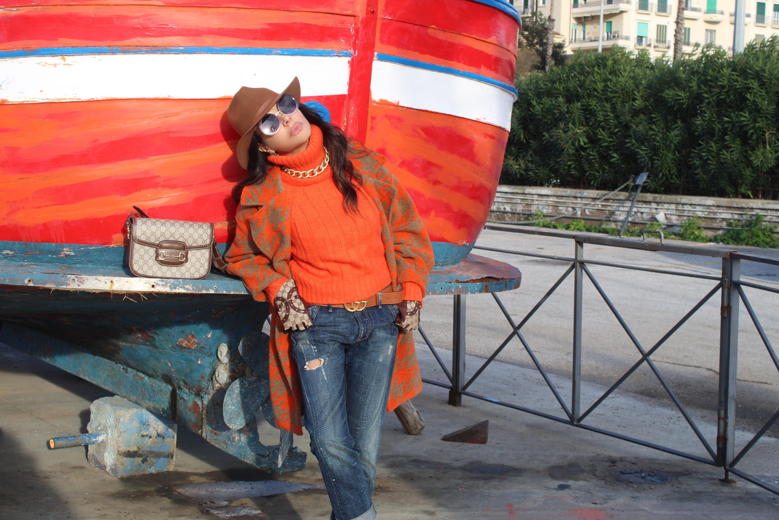LUMINA FASHION coat and turtleneck sweater  DOLCE & GABBANA jeans  GUCCI accessories Paola Lauretano