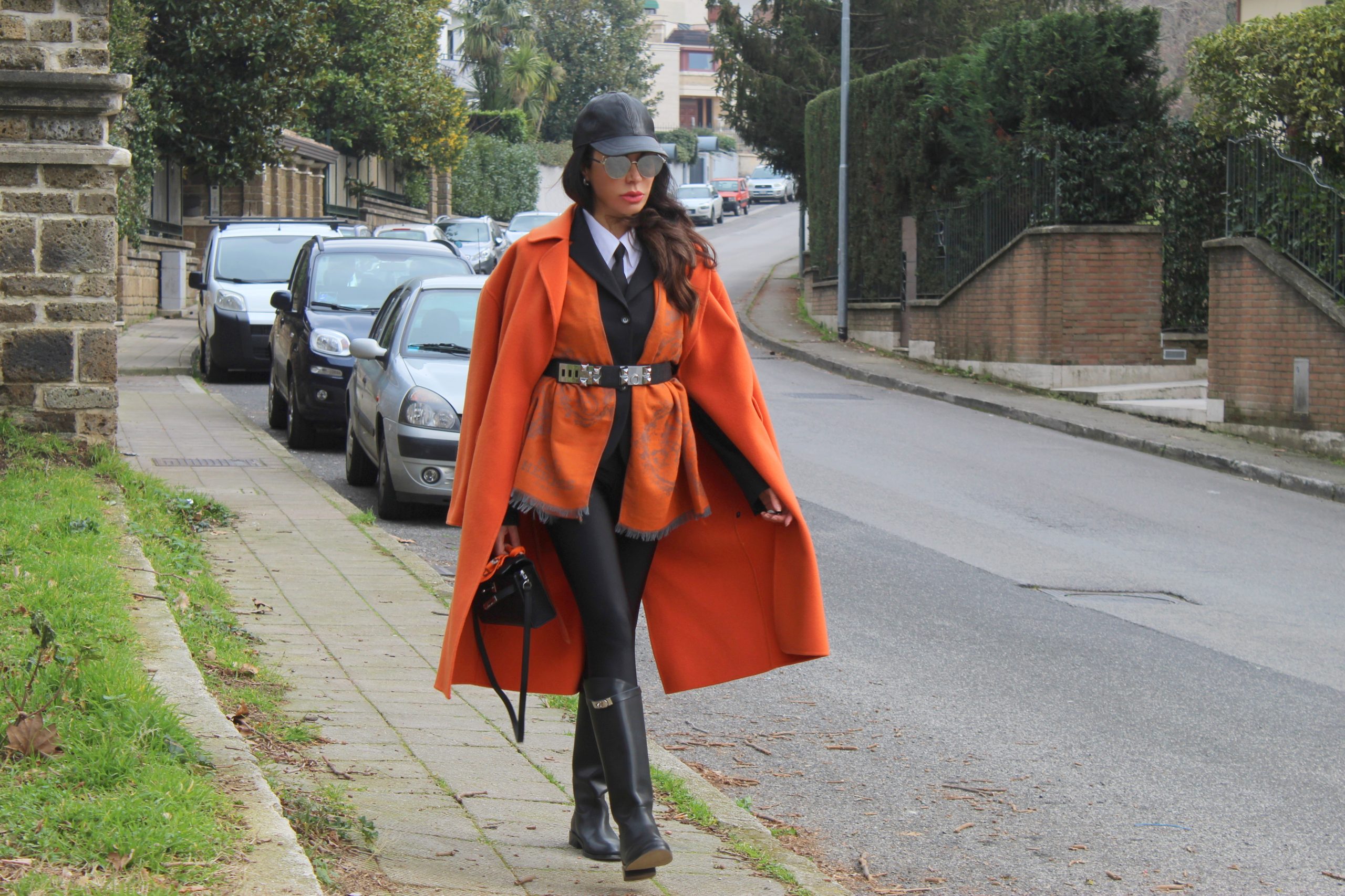 equestrian style orange and black MAXMARA coat HERMES accessories Paola Lauretano 