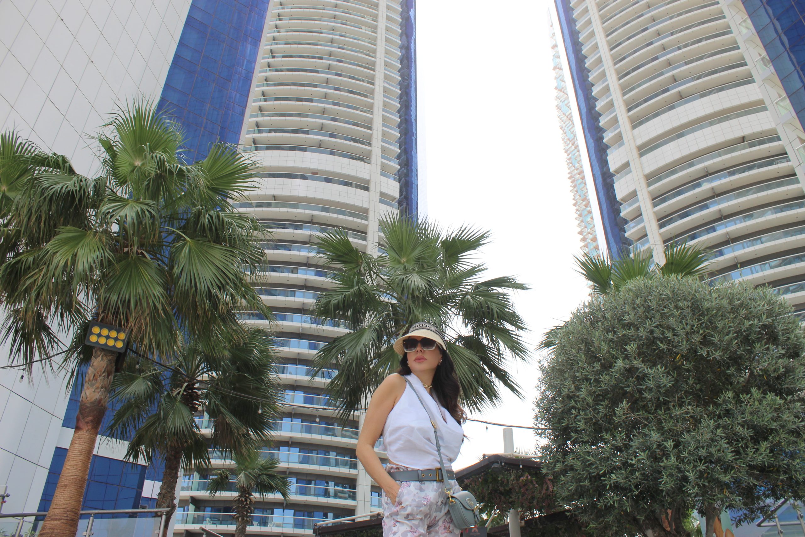 PATRIZIA PEPE top and pants  DIOR sunglasses, hat, jewelry, belt and bag CHANEL sandals Dubai Gateaway Travel blogger Lifestyle blogger Paola Lauretano