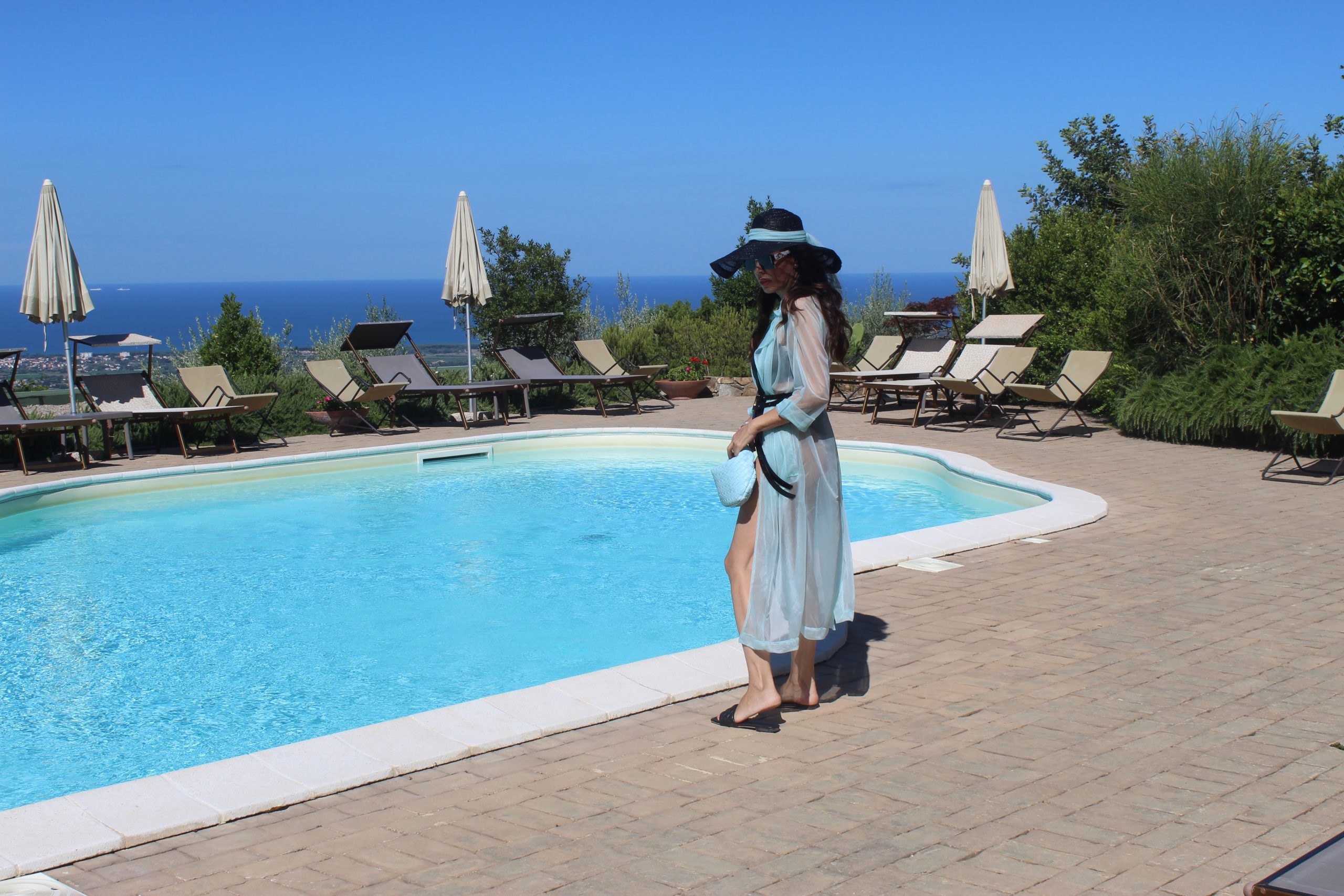 JUCCA cover up   4GIVENESS trikini   BOTTEGA VENETA accessories Paola Lauretano Influencer Blog Travel Visit Italy