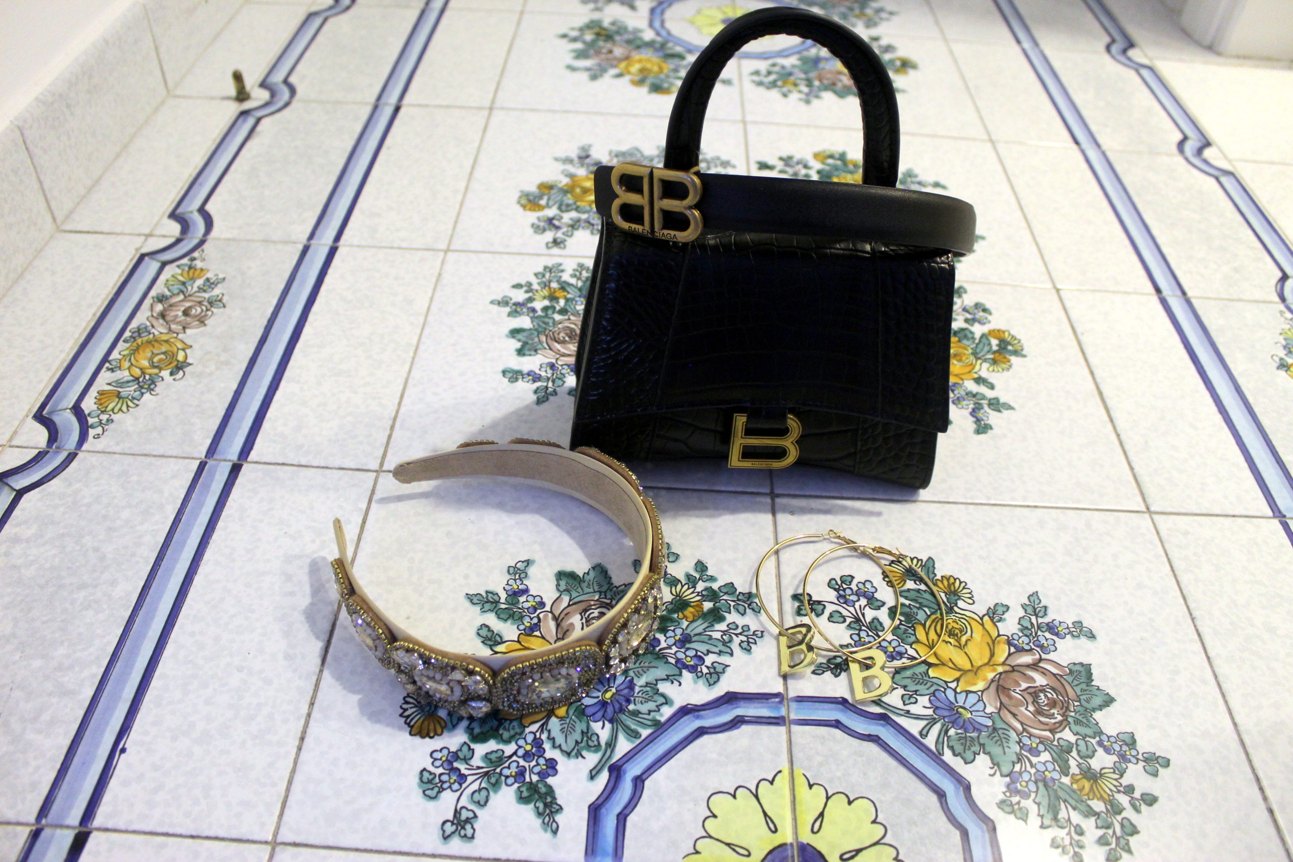 BALMAIN little black dress BALENCIAGA earrings, belt and bag BOTTEGA VENETA shoes Paola Lauretano Capri 