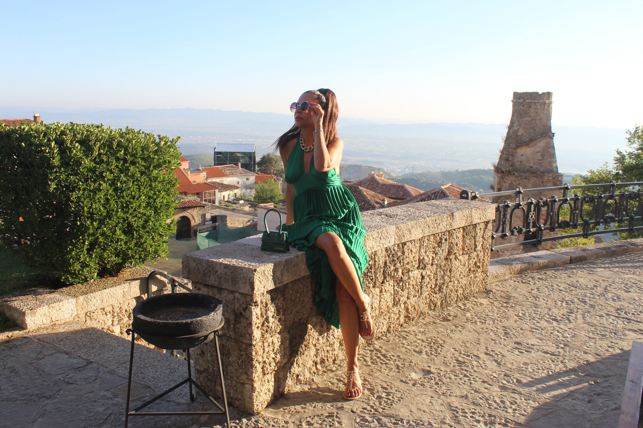 ANGELA DAVIS dress JAQUEMUS bag CHANEL sandals Paola Lauretano Albania Travel Blogger